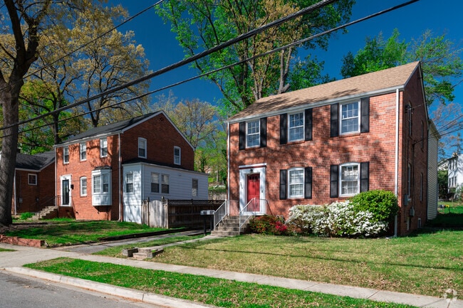 Two brick colonials on a shady street in Hyattsville
