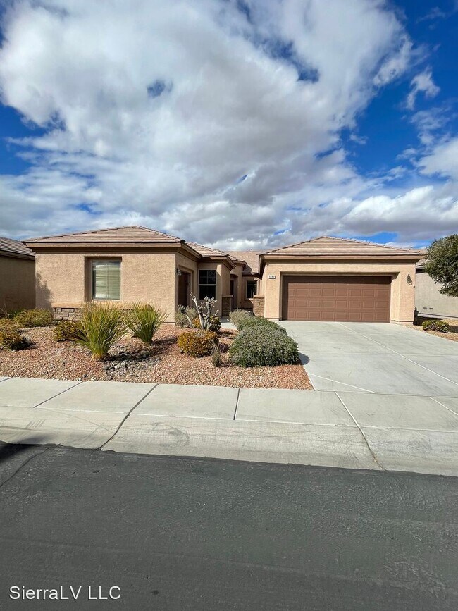 Building Photo - 4 br, 2 bath House - 5942 Spanish Mustang Ct