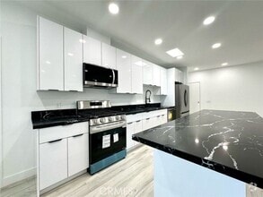 Building Photo - 6255 Woodman Ave