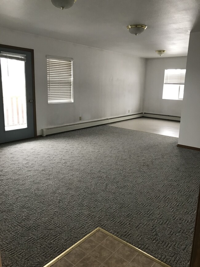 Living room looking toward the deck - 161 E Susitna Ave