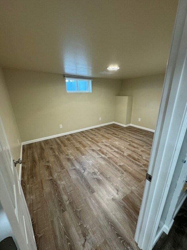 Building Photo - 6-Bedroom Home with BBQ Haven, She-Shed, a...