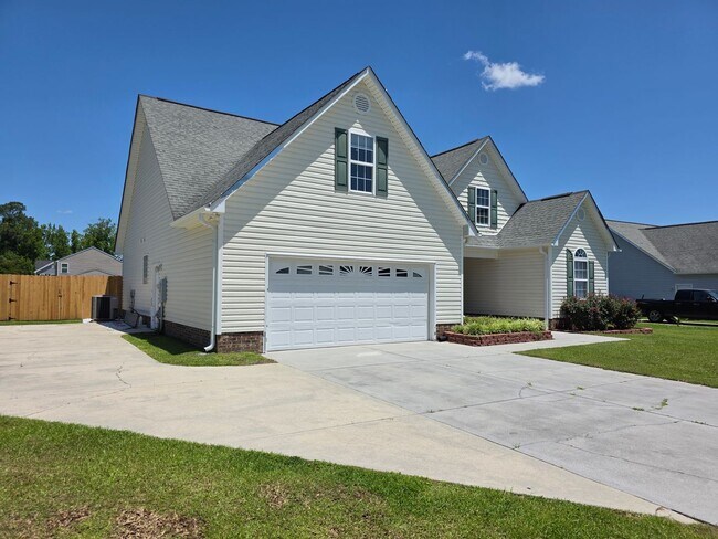 Foto del edificio - Spacious 4-Bedroom Bryan Farms Beauty with Bonus Suite, Large Fenced Yard & RV/Boat Parking!