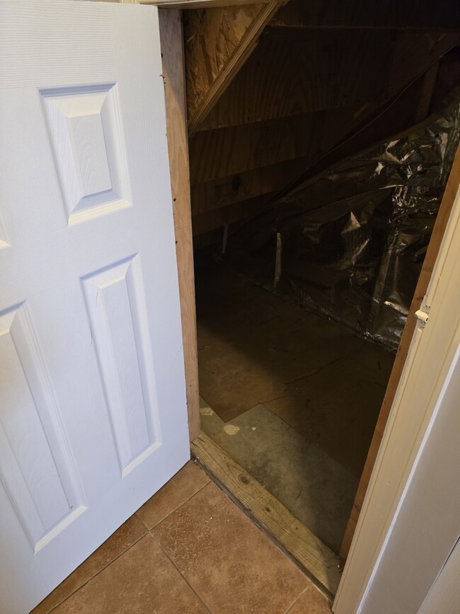 STORAGE SPACE UNDERNEATH STAIR CASE - 16304 Elkhorn Ln