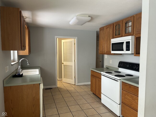 Building Photo - 8667 N Ricks Dr E