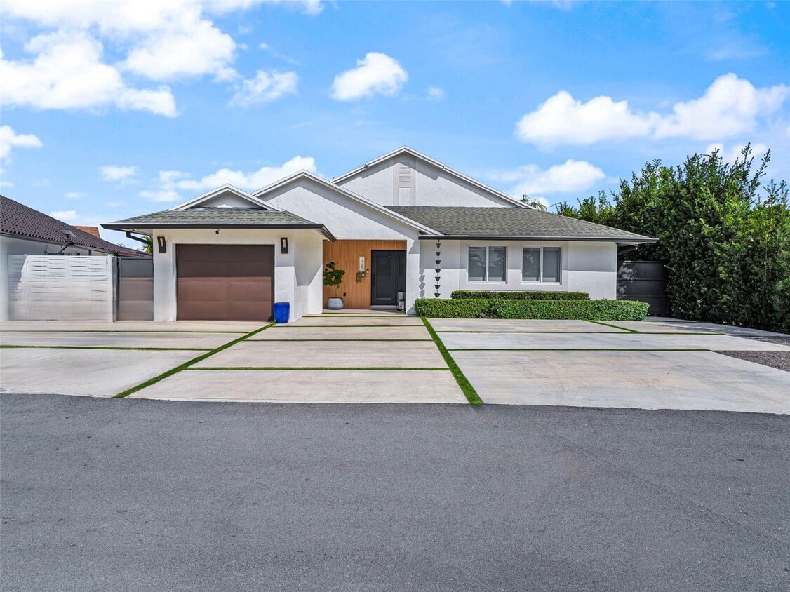 Photo - 7753 Northwest 189th Street, Hialeah, FL 33015 - 4 BR 2 BA single-family home