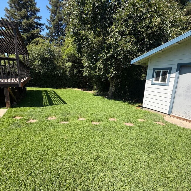 Building Photo - Adorable house with large deck,  yard and RV access