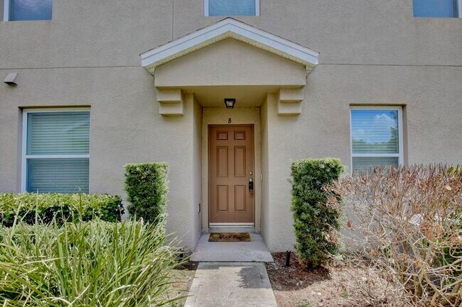 Building Photo - Spacious 3/2.5 Townhome with a 2 Car Garage and a Beautiful Pond View in Westwood Condos - Orlando!