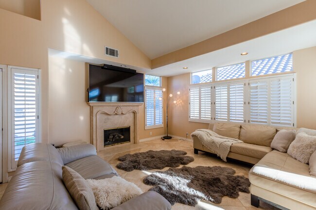 Living room with custom cast marble fireplace - 15 San Bernardino Ave
