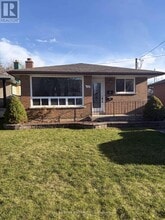 Building Photo - 653 Athol St E
