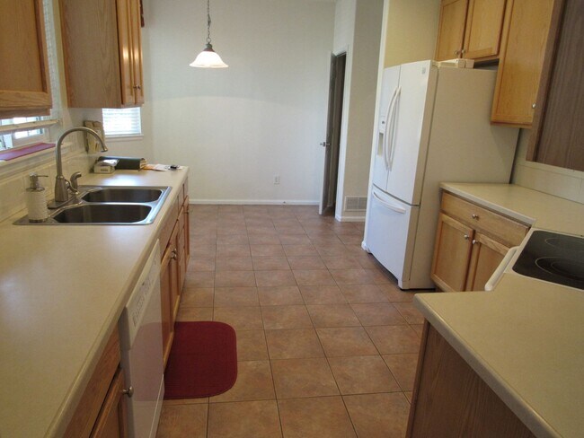 Building Photo - Ranch living in this Spacious Townhome in ...