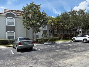 Building Photo - 13827 Fairway Island Dr