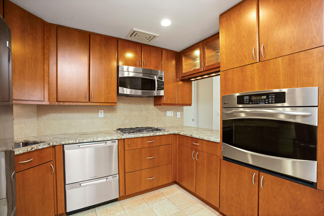 Marble counters and cherry cabinets. - 50 E Hartsdale Ave