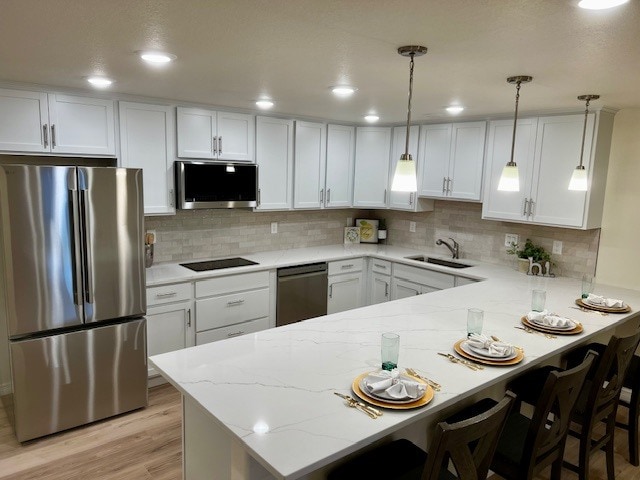 Modern kitchen with new LG appliances, quartz counters, soft close cabinets - 28011 E Otero Pl (Aurora, CO)