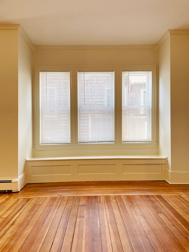Living Room / Dining Room - built-in window seat - 228 Doyle Ave