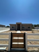 Building Photo - 9208 E Ave T 6