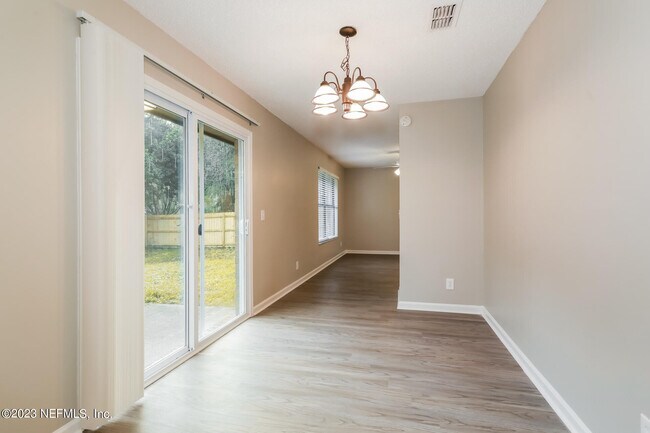 Building Photo - 6353 Tree Top Cir W