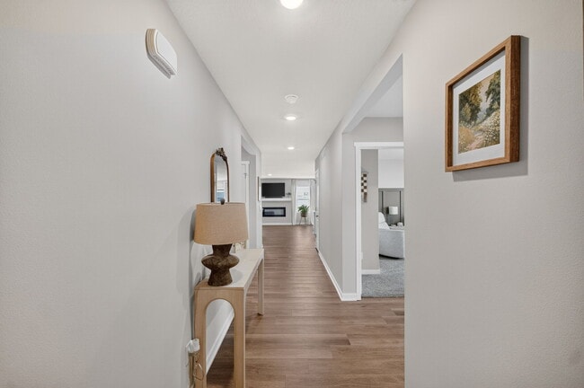 hallway leading to bedrooms, bath and laundry - 1080 Bel Aire Ct