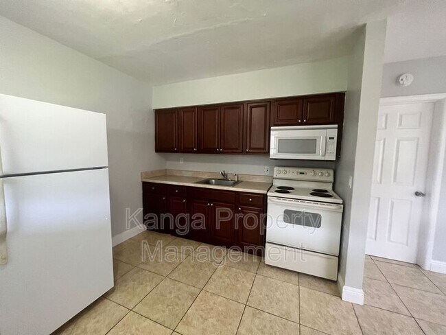 Photo - 4820 Maine St Apartment