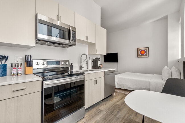 Building Photo - Exhibit A2 Furnished Luxury Apartments