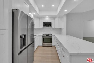 Building Photo - 4477 Woodman Ave