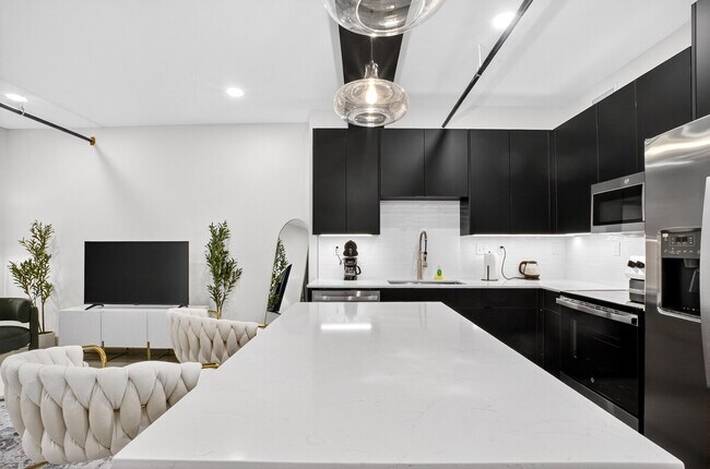 Foto del edificio - 115 W 5th St