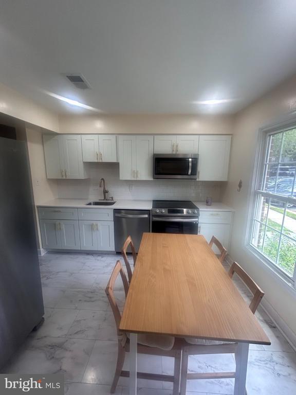 Foto del edificio - 5664 Cabells Mill Ct