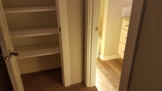 Upstairs hall closet - 1565 Madras St SE