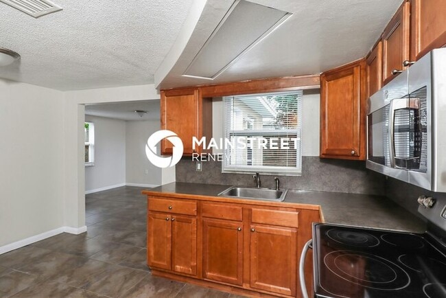 Building Photo - 3 Bedroom Pet-Friendly Home in Port Richey, FL with Main Street Renewal