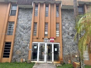 Building Photo - 1280 W 54th St