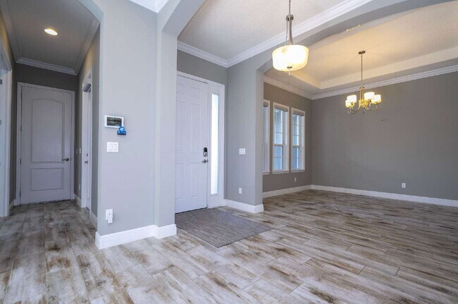 Foto del edificio - Spacious 4-Bed, 4-Bath Haven in Winter Garden – 3,388 Sq. Ft. of Comfort on Green Mountain Way