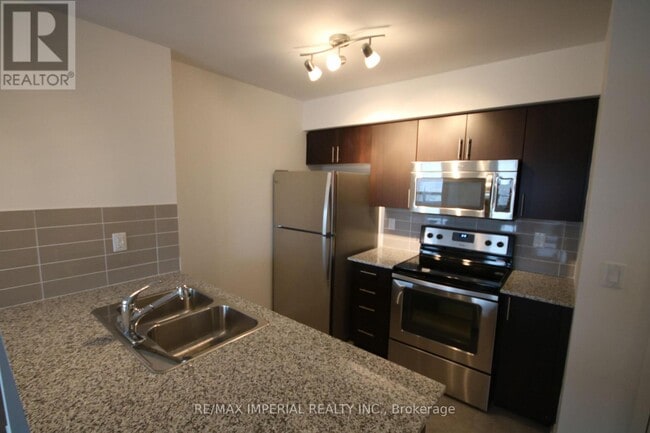 Photo du bâtiment - 1410 Dupont St