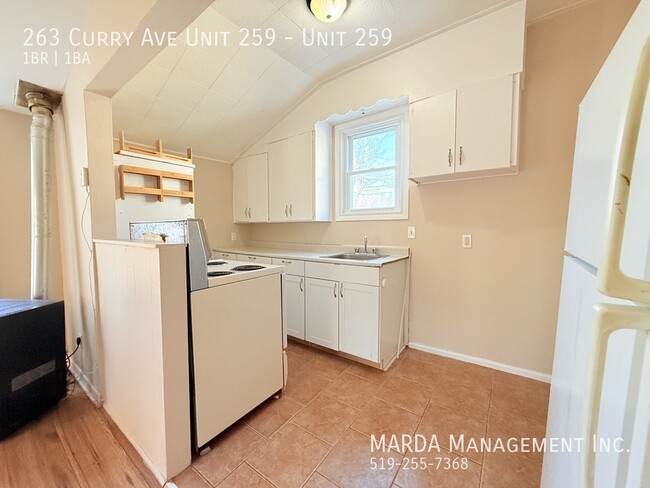 Photo du bâtiment - COZY 1-BEDROOM/1BATH MAIN FLOOR APARTMENT+...