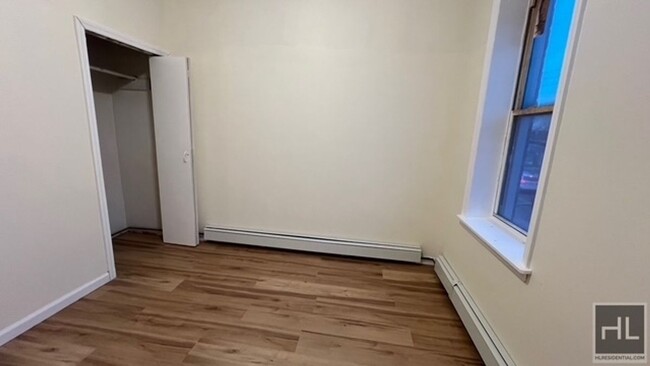 Building Photo - FRESHLY RENOVATED SUNNY AND SPACIOUS  2 BE...