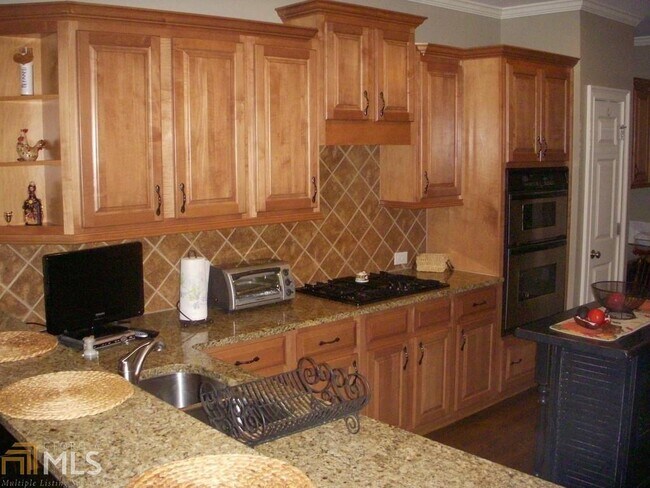 Foto del edificio - 4309 Village Green Dr