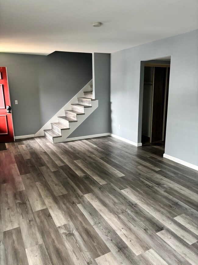 New hardwood flooring throughout unit - 825 Dumont Pl