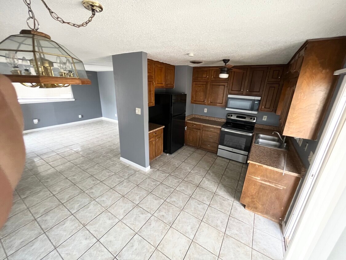 Breakfast Area towards Kitchen and Living Area - 6400 Pizarro Dr