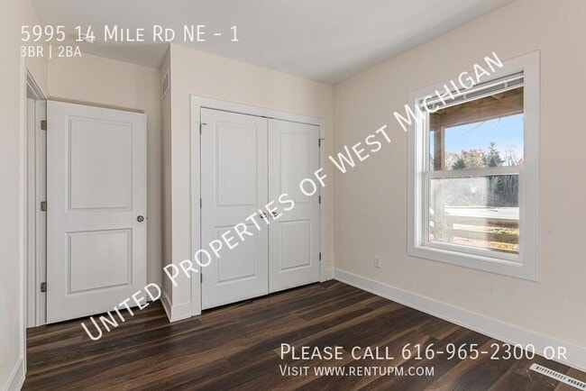 Building Photo - 5995 14 Mile Rd NE