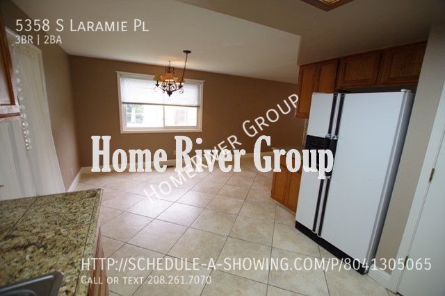 Building Photo - 5358 S Laramie Pl