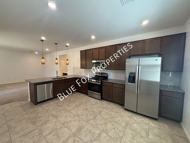 Building Photo - 7095 W Jadewood Ln