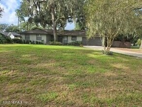 Building Photo - 3128 Blue Heron Dr N