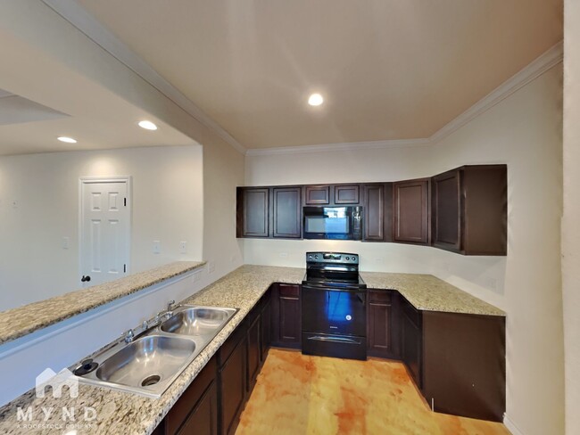 Building Photo - 6415 Melanzane Ave