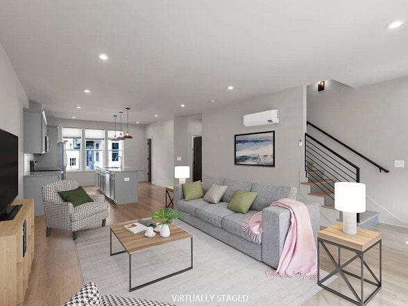 Open concept living room / kitchen - 339 E Village Ln