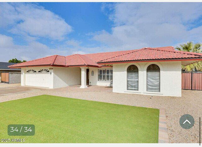 Building Photo - 7414 W Windrose Dr