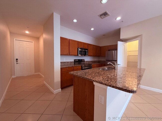 Building Photo - 9491 SW Merlin Ct