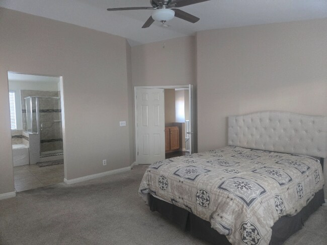 Building Photo - 8061 Yellow Daisy Ave