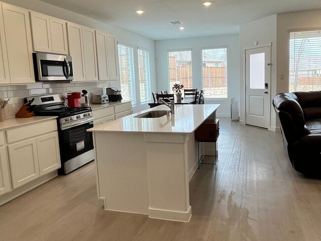 Photo - Beautiful Newer 3-2-2 with WOW Yard! May 2026 Move-in! House