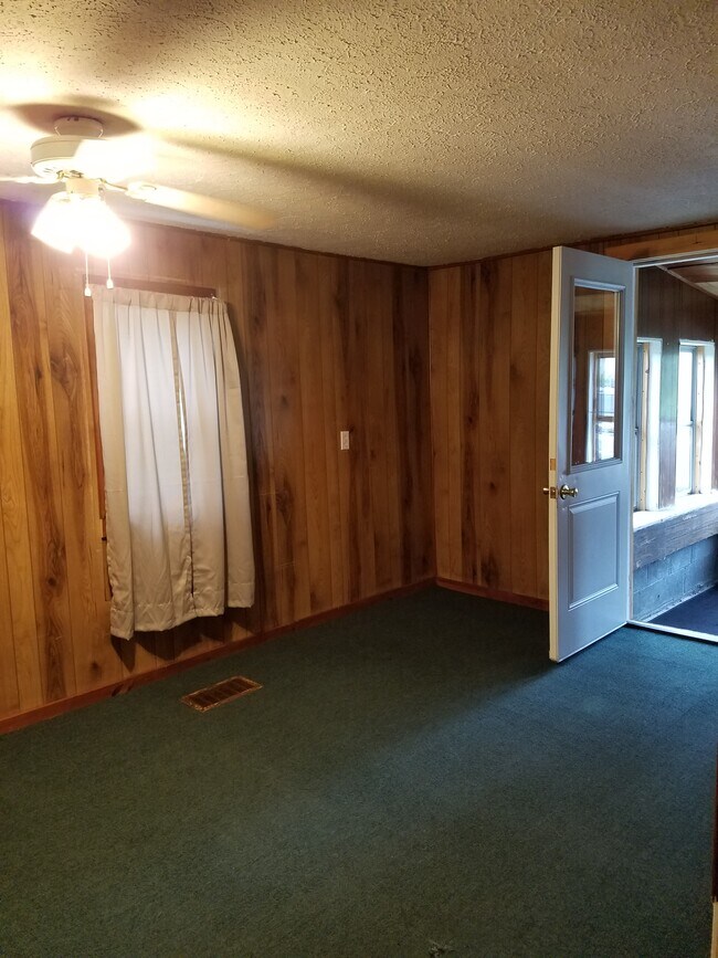 Dining room, north wall. Wall to wall carpeting, one window, ceiling fan with light - 15 Goodrich St