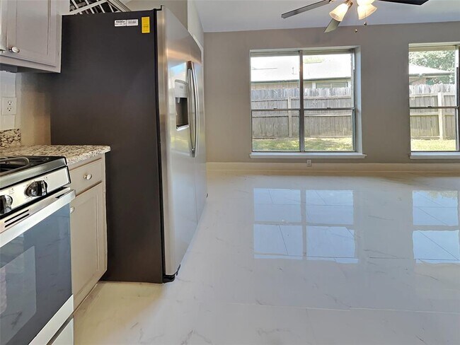 Building Photo - 5935 Woodmancote Dr