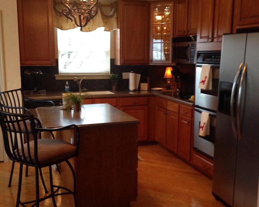 Kitchen with stainless steel appliances. - 2 Monarch Trace Ct