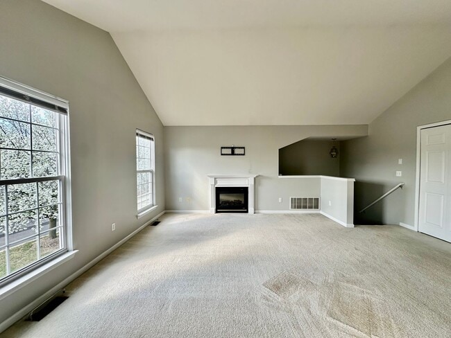 Building Photo - Just Listed! Sun-Filled 2BR Condo with Fireplace & Garage – Won’t Last!